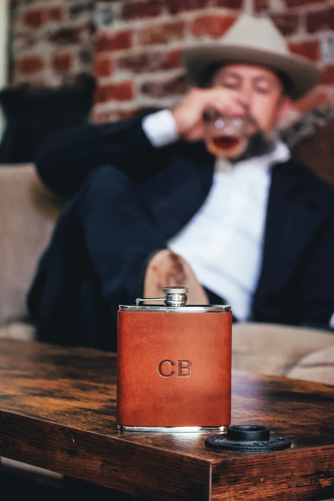 Full-grain American leather 6 oz capacity Handcrafted with care in our own factory  Includes stainless steel flask funnel Dimensions: 5" L x 4.5" W