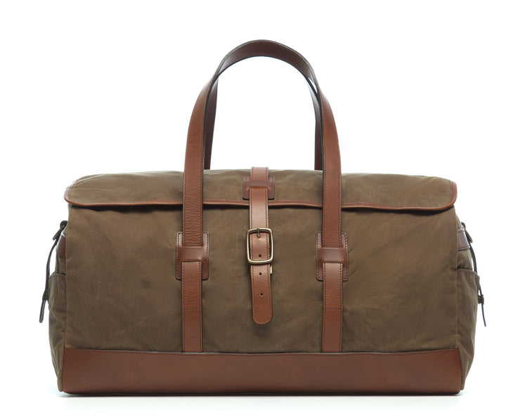 Olive 22" Waxed Canvas Weekender One of our best-selling weekender styles, the waxed canvas Twain is ideal for leisure or business travel. At 22", it is designed to fit comfortably in most airline overhead compartments. The Twain waxed canvas duffel bag is handcrafted with water-resistant waxed canvas and includes a removable, adjustable leather shoulder strap.