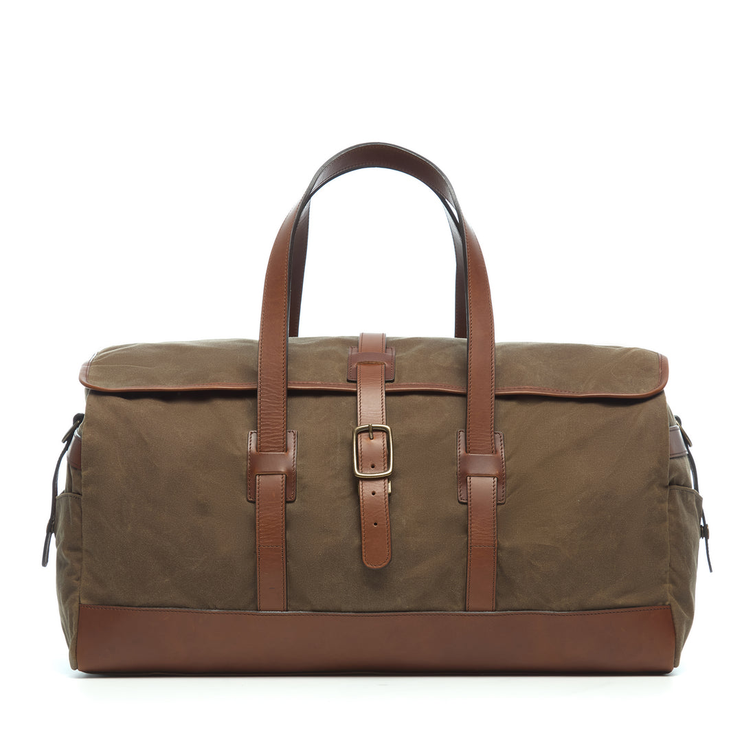 Olive 22" Waxed Canvas Weekender One of our best-selling weekender styles, the waxed canvas Twain is ideal for leisure or business travel. At 22", it is designed to fit comfortably in most airline overhead compartments. The Twain waxed canvas duffel bag is handcrafted with water-resistant waxed canvas and includes a removable, adjustable leather shoulder strap.