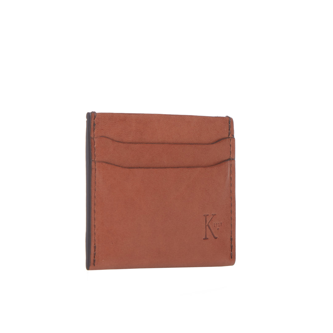 Handcrafted with American full-grain leather, the Francis leather card case offers a slim, sleek option for those who only need to carry a few things on the go. #color_brown