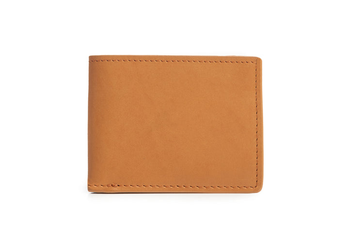 Tan Slim leather wallet The York leather billfold is handcrafted with American full-grain leather and offers a slim minimalist profile. With six scalloped credit card pockets and a vertical stash pocket, the York is perfect for traveling light while keeping your cards and cash secure. #color_tan