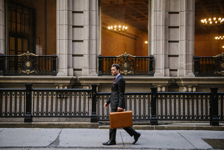 A true classic, the Monroe is a full grain American leather attache case. Handcrafted with the widely regarded piano hinge construction technique, and featuring a secure combination locking system, the Monroe stylishly protects confidential files and can accommodate most 17" laptops. Tan #color_tan