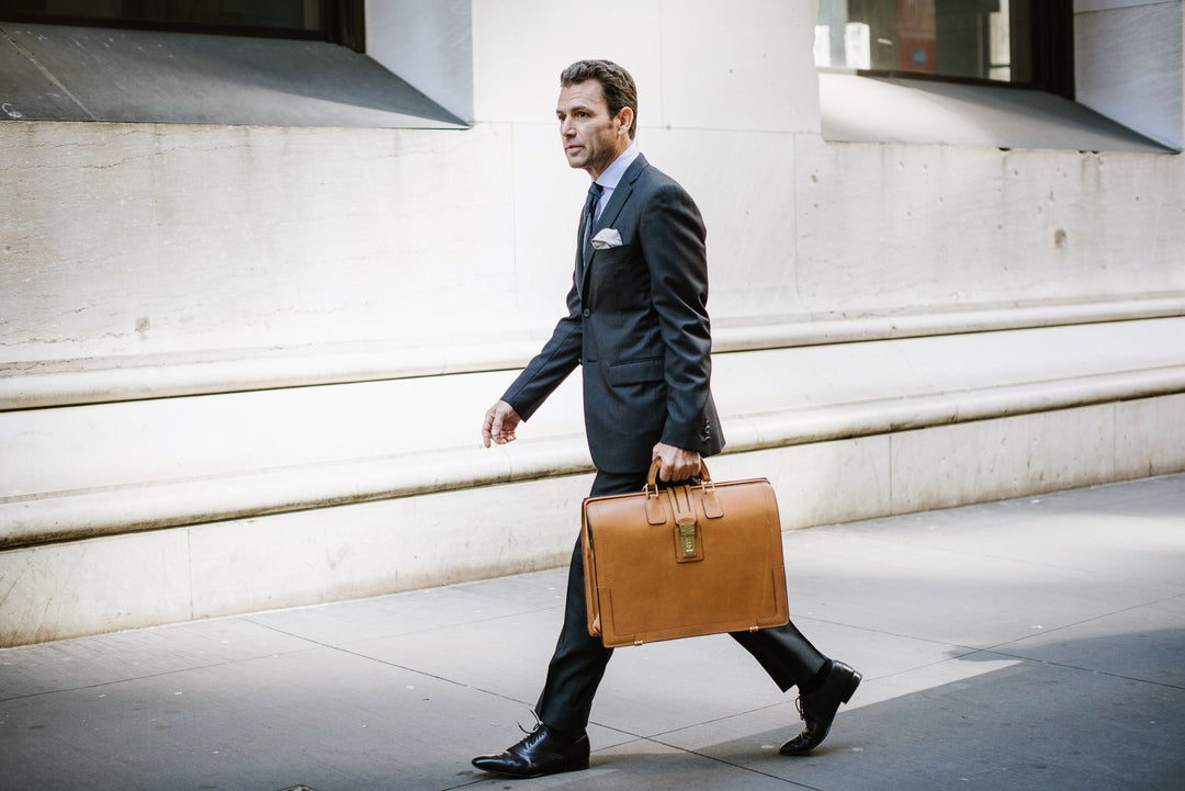 The Churchill is a classic, handcrafted full grain leather briefcase that features a handsome silhouette, and our patented Hinge-Loc technology, which allows the top frame to stay open with ease. #color_tan