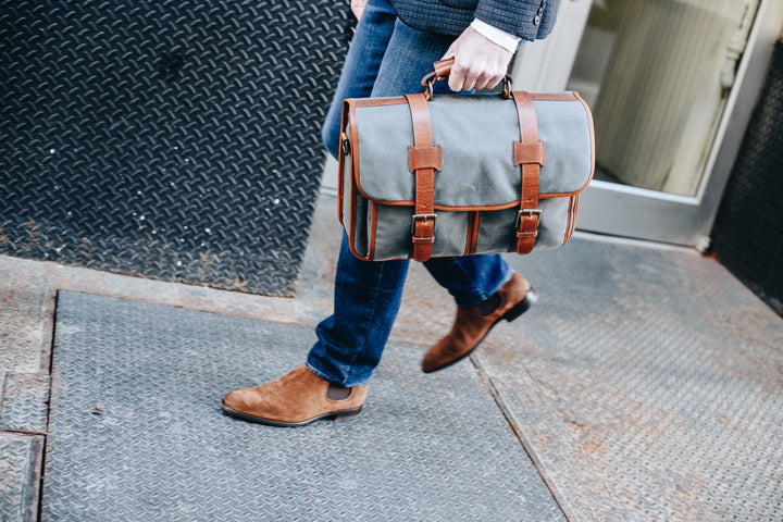 Removable, adjustable shoulder strap with ergonomic pad Handcrafted with care in our own factory Fits up to a 15" laptop Dimensions: 16.5" x 6" x 13"
#color_grey