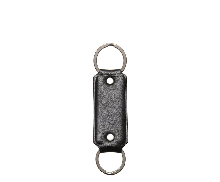 Keychain in black leather with embossing